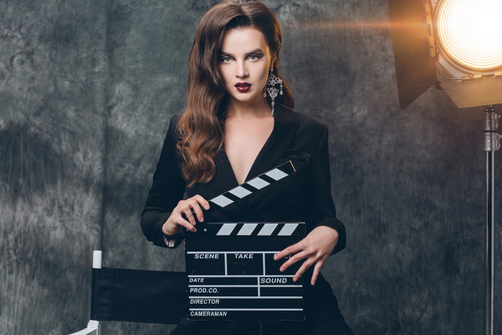 young-beautiful-stylish-sexy-woman-cinema-backstage-holding-movie-clapper