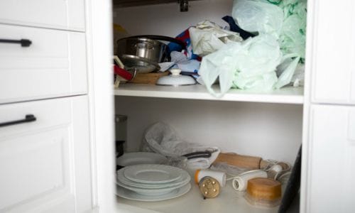  cluttered-kitchen-cabinet-before -organization